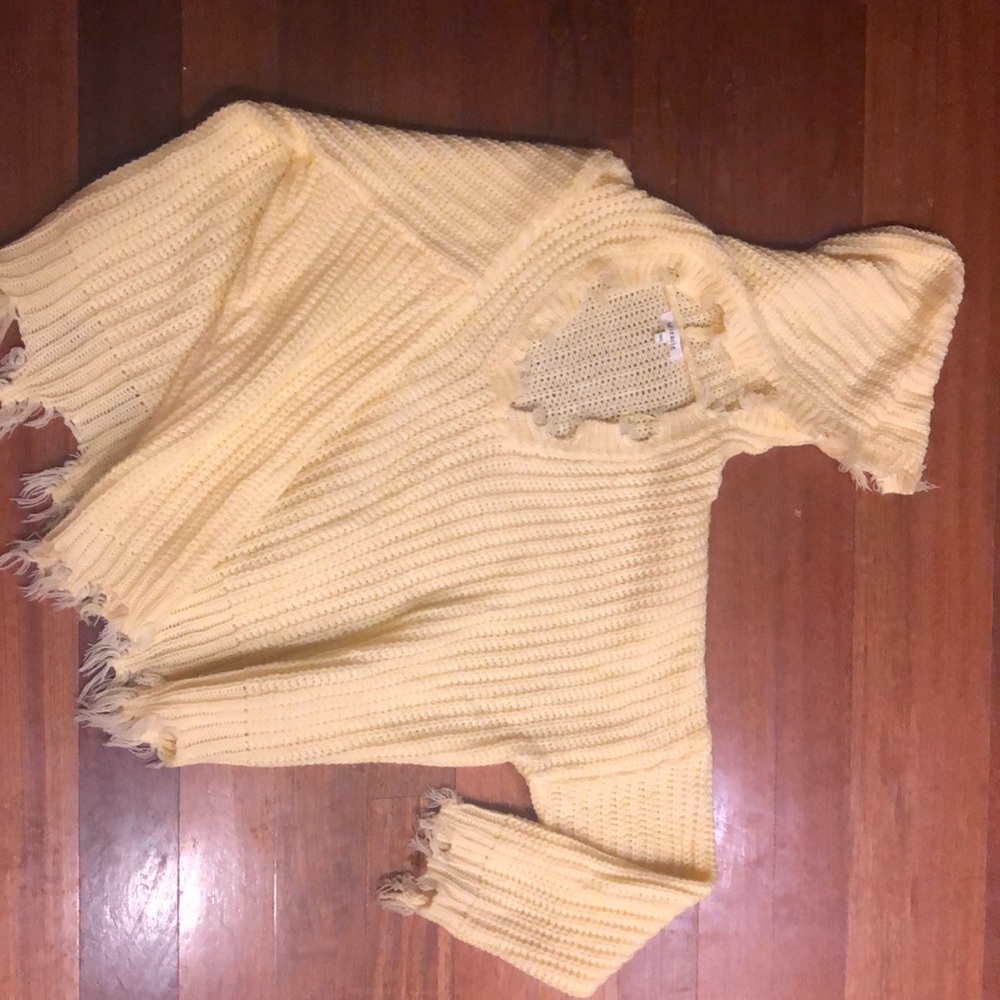 Yellow oversized ripped sweater